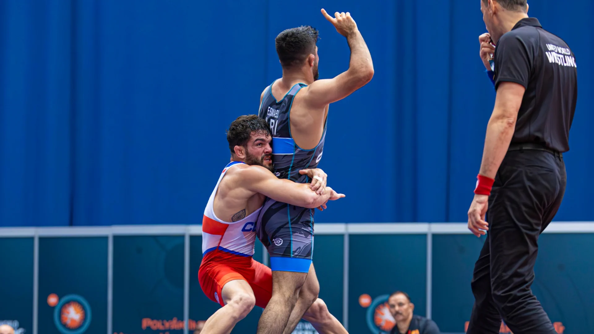 Iranian wrestler beats reigning Olympic champion, knocks him out of Olympic gold medal race